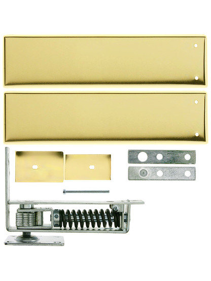 Standard Duty Swinging Door Floor Hinge With Plated-Steel Cover Plates in Polished Brass Finish.